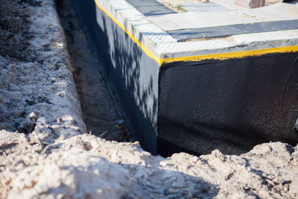 Residential Interior Drainage System installation at a Montezuma, OH home by SJ Waterproofing Pros